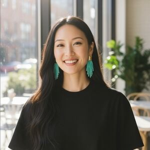 Women's gold beaded tassel earrings